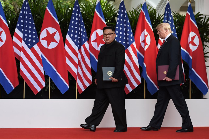 Optimism, caution and security guarantees: Trump, Kim sign 'comprehensive' document