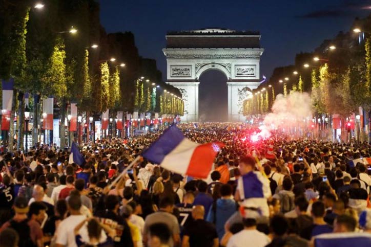 Parisians sing 'Ole,Ole' and dance throughout night as France reaches World Cup final