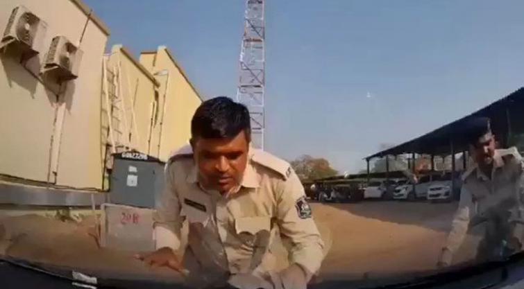 Gujarat AAP leader drags cop on car bonnet, charged 