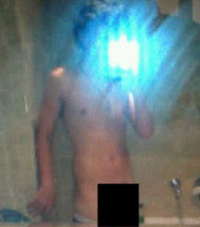One Direction's Harry Styles denies nude photo leaked online is of him
