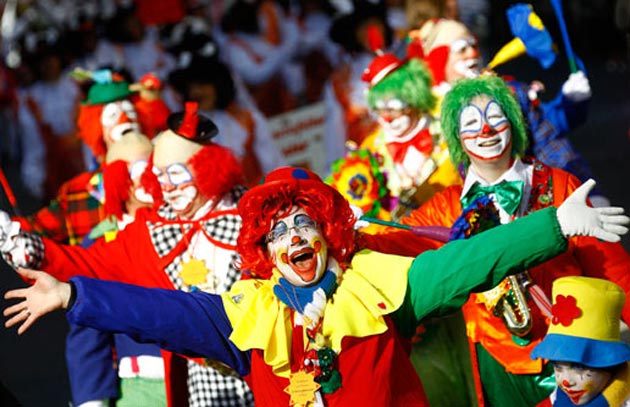  Carnival revellers dressed as clowns