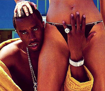 P. Diddy posts a graphic pic with his hands under a lady's privates part 