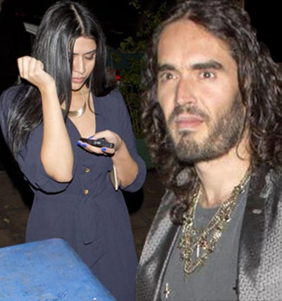 Russell Brand leaves dinner date with a mystery brunette