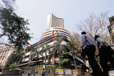 Sensex tumbles over 335 points on global cues