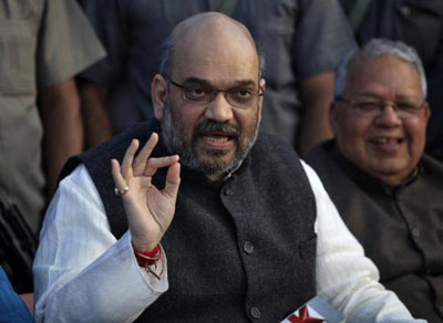 Murder charges dog right-hand man of Narendra Modi