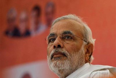 Modi stands by Hindu customs but wants progress for Muslims