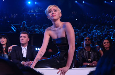 Miley Cyrus' MTV awards date wanted on probation violation