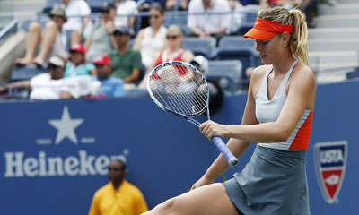 Caroline Wozniacki knocks Maria Sharapova out of US Open