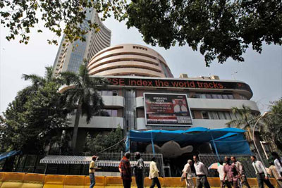 Sensex trims initial losses on Infosys results