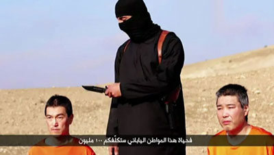 Japan vows to 'never give up' search for Islamic State hostages