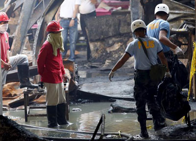 Death toll in Philippine slipper factory fire rises to 72