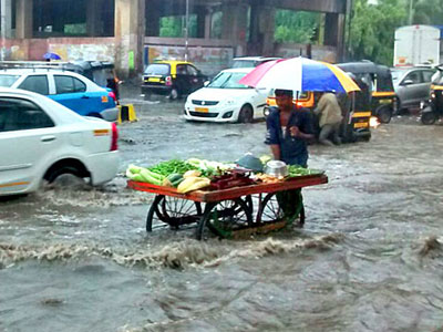 Rains in Mumbai after dry spell, suburban services hit