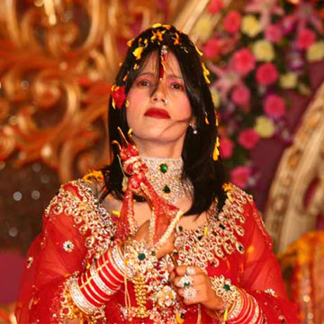 How is 'daddy' connected to controversial 'godwoman' Radhe Maa?