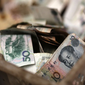 China's yuan firms slightly, supported by rise in stocks 