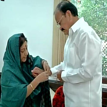 Raksha Bandhan: Sushma Swaraj ties rakhi to M Venkaiah Naidu