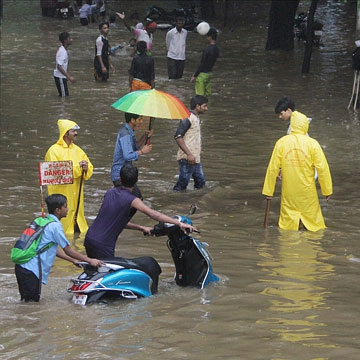 Mumbai rains slows down city, disrupt normal life, suburban services 