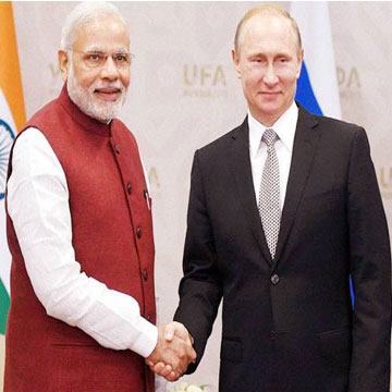PM Narendra Modi meets Vladimir Putin in Goa; India, Russia set to sign mega defence deals