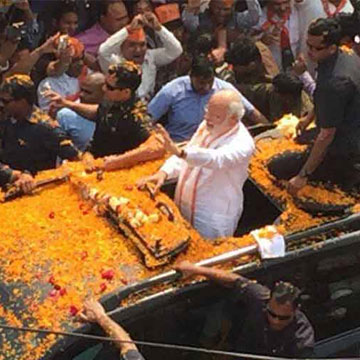 Narendra Modi leads road show in Varanasi, prays at historic temples