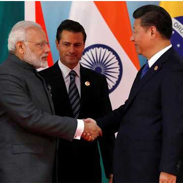 PM Modi congratulates Xi Jinping for successful execution of BRICS Summit 2017