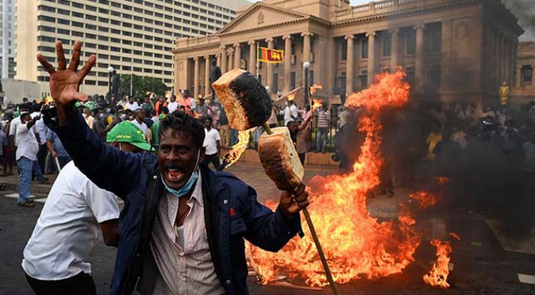 Sri Lanka President Gotabaya Rajapaksa flees as protesters surround his residence